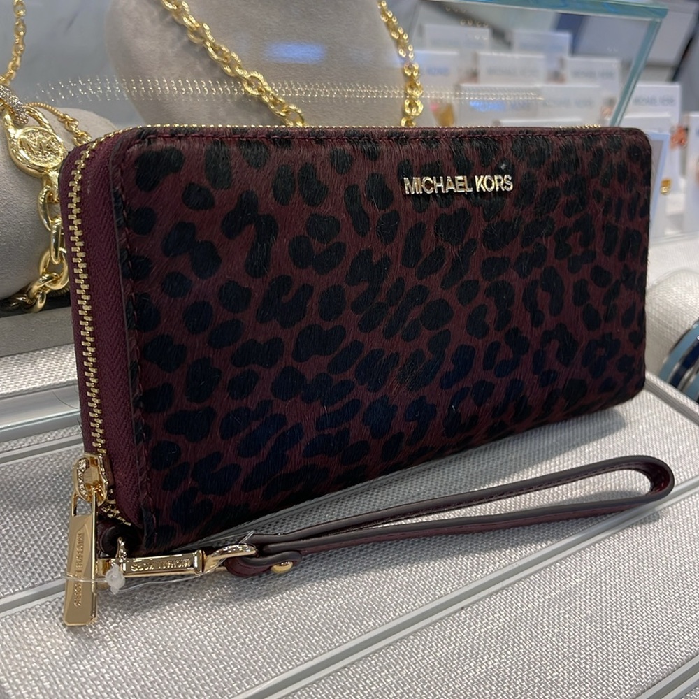 MICHAEL KORS
Leather Lg Continental Wristlet Phone Wallet Exotic Print Hair Culf - Picture 2 of 16
